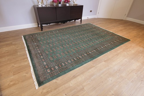 100% Wool Green Fine Pakistan Bokhara Rug Design Handknotted in Pakistan with a 10mm pile